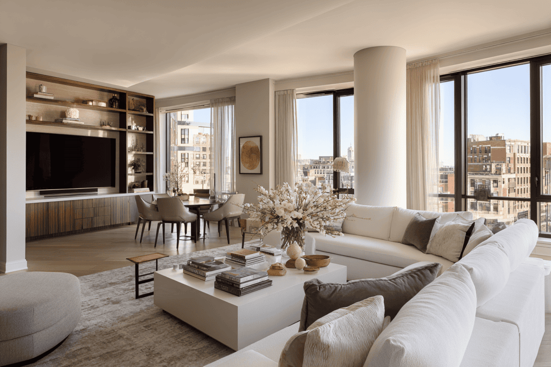 Open-plan NYC living space with integrated lighting and furniture layout demonstrating coordination between architecture and design