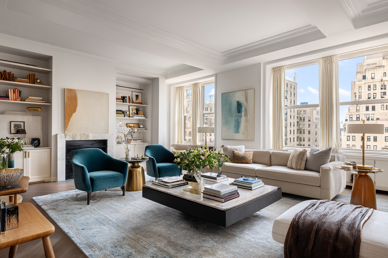 Flexible NYC living and dining space with concealed storage millwork for seamless daily life and entertaining